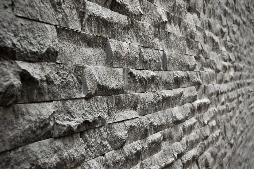 coarse rugged slanted lonely wall