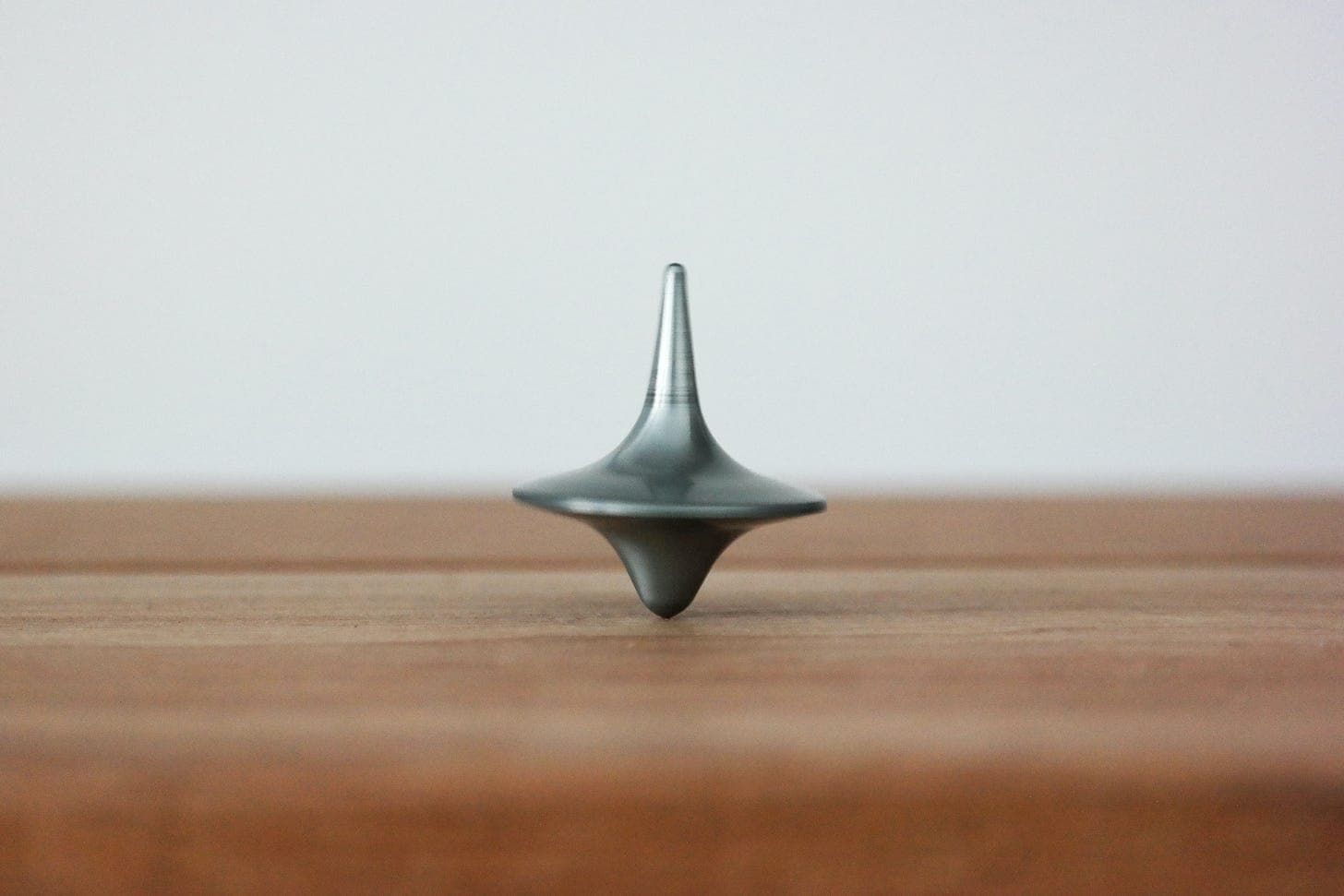 a top balanced on the floor